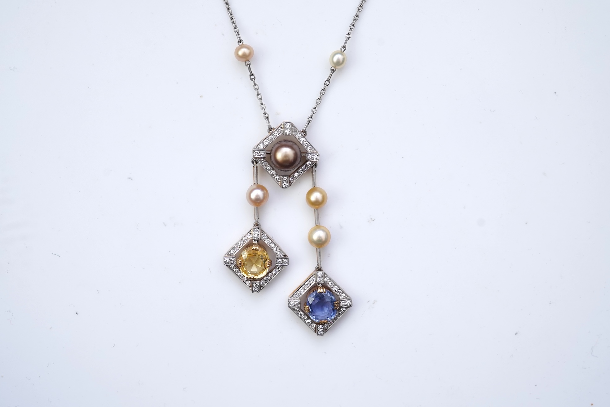 An Art Deco sapphire, natural pearl and diamond necklace, circa 1920